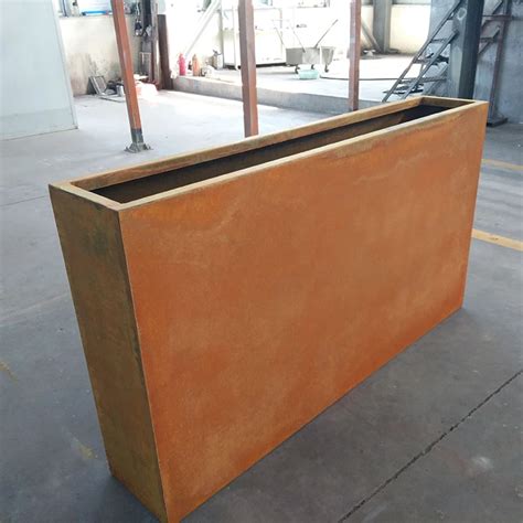 rusted metal planter box|large rabbit box rust.